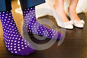 Colorful socks of groom photo