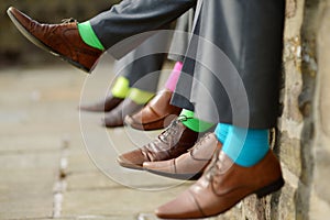 Colorful socks of groomsmen photo