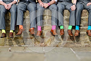 Colorful socks of groomsmen photo