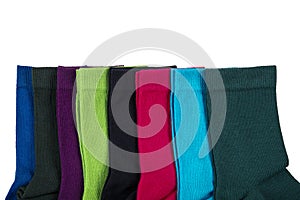 Colorful socks isolated on white background. Different colors of socks are red, green, yellow, blue, etc. winter accessories.