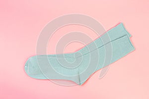 Colorful socks on pink  background  - Image
