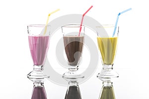 Colorful sommer frappes with reflection on bright background