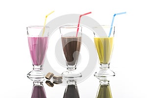 Colorful sommer frappes with reflection on bright background photo
