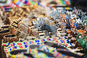 Colorful South African Bead Art in Bracelets, Rhino and Hippos in open air market