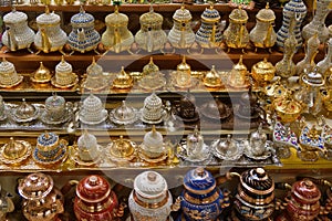 Colorful souvenirs from traditional Turkish jugs on the counter