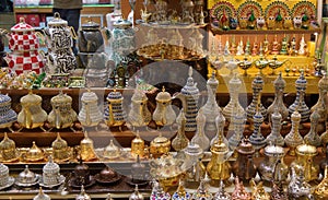 Colorful souvenirs from traditional Turkish jugs on the counter