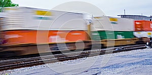 Colorful Speeding Double-stack Freight Train