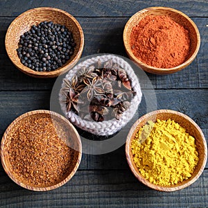 Colorful spice powder, chilli, pepper, turmeric, cashew