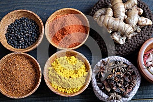 Colorful spice powder, chilli, pepper, turmeric, cashew
