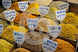 Colorful spices with arabic description on Suq in Damascus photo