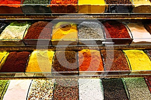 Colorful spices in a traditional Turkish Bazaar. Spices for cooking. Shop with spices. Sale of Oriental spices. East kitchen