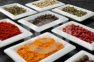 Colorful spices in white bowls Seasonings for cooking. Natural Spices