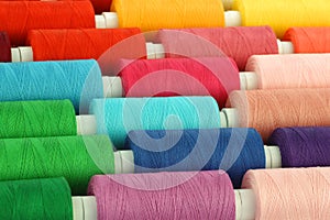 Colorful spindles of yarn