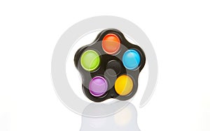 Colorful spinner and Push pop bubble sensory anti-stress toy, isolated on white background