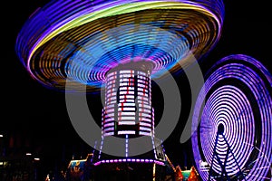 Colorful Spinning Swings, Ferris Wheel at Night