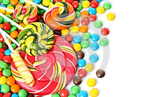 Colorful spiral lollipop with chocolate coated candy