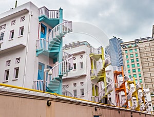 Colorful spiral stairs and colorful urban of Singapore`s Bugis Village.