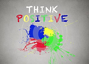 Colorful splashes and think positive writing, words banner