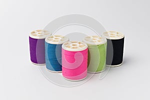 Colorful Spool of thread isolate on white background.