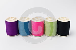 Colorful Spool of thread isolate on white background.