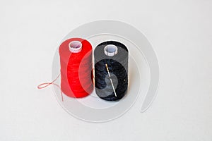 colorful spools of sewing thread isolated on white background