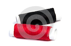 Colorful spools of thread isolated on white background/