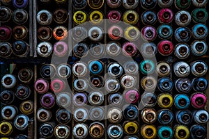 Colorful spray graffiti bottles stacked to be a background image, Karakoy, Istanbul, Turkey
