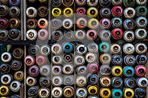 Colorful spray graffiti paint bottles stacked to be a background image, Istanbul, Turkey