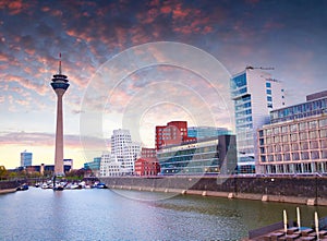 Colorful spring sunset of Rhein river at night in Dusseldorf