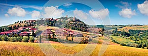 Colorful spring view of Pienza town. Picturesque morning panorama of Tuscany, San Quirico d`Orcia, Italy, Europe.