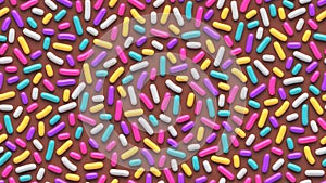 Colorful sprinkles on chocolate background