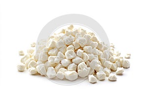 A colorful stack of marshmallows on a clean white background