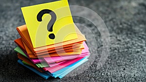 Colorful Stack of Sticky Notes With Question Mark on Top Note