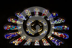 Colorful stained-glass windows in rose window