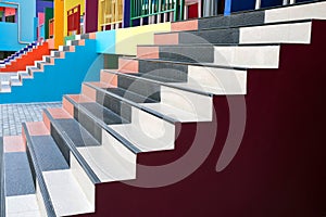 Colorful stairs of the building homes.