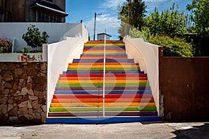 Colorful stairs painted with the colors of the rainbow