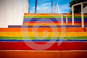 Colorful stairs painted with the colors of the rainbow