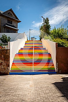 Colorful stairs painted with the colors of the rainbow