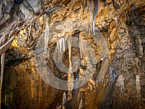 Colorful stalactites in the cave