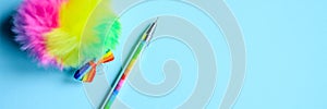 Colorful stationery. multicolored pen on blue background. banner.