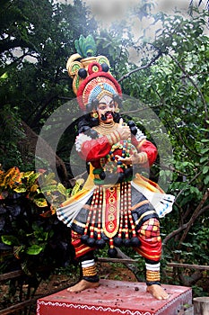 Colorful statue of yakshagana performer at Janapada Loka folk art museum near Ramanagara, India photo