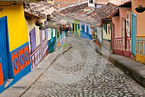 A colorful steep street in Guatape (Colombia).