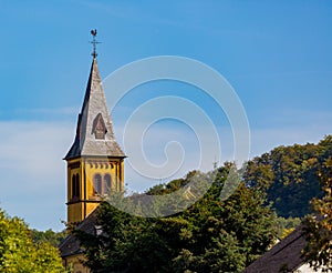 Colorful steeple pierces the sky above Grevenmacher