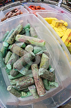 Colorful Sticks Of Chalk Sit In Plastic Containers