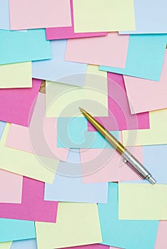 Colorful sticky notes on cork bulletin board