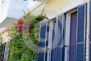 Colorful and stone houses in narrow street in Alacati cesme