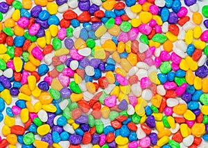 Colorful stone pattern on white background and selective focus