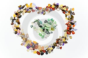 Colorful stones in heart shape isolated