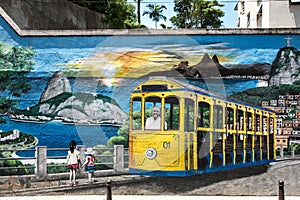 Colorful street art depicting a bond tram driving above the city