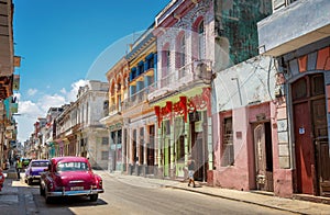 Colorful street with classic old cars in Havana Cuba